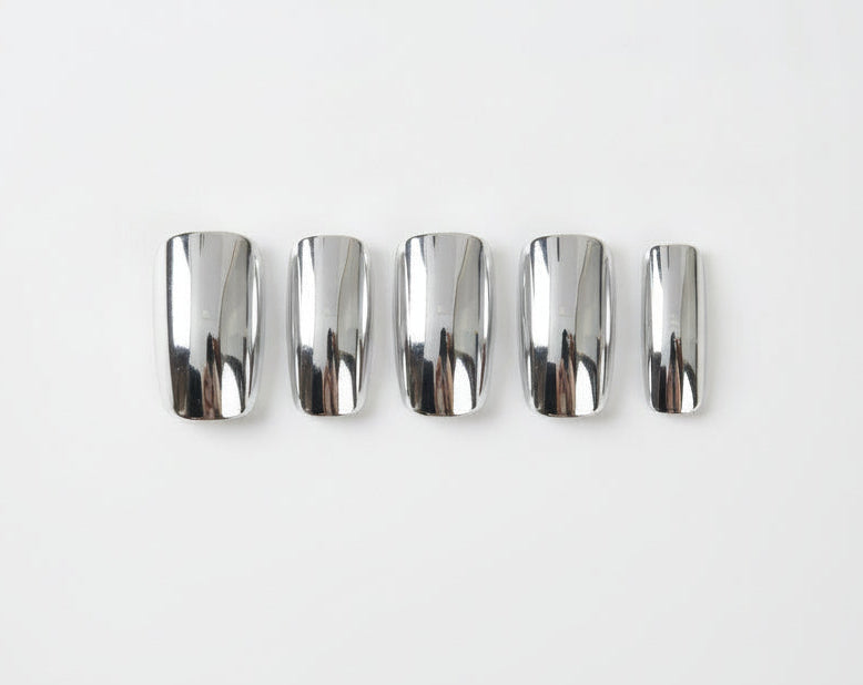Single (1) silver nail
