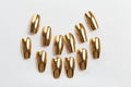 Single (1) gold nail